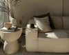 #A stylish living room with modern decor, featuring a modular sofa and elegant accessories